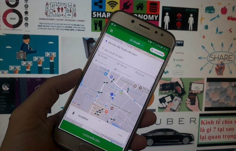 Grab mua lại Uber có dấu hiệu vi phạm?