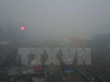 Trung Quốc ô nhiễm nặng, khói mù bao phủ cả miền Bắc