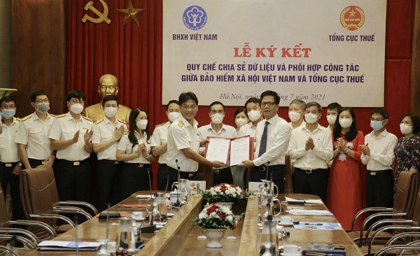 Bảo hiểm xã hội Việt Nam và Tổng cục Thuế ký Quy chế chia sẻ dữ liệu và phối hợp công tác