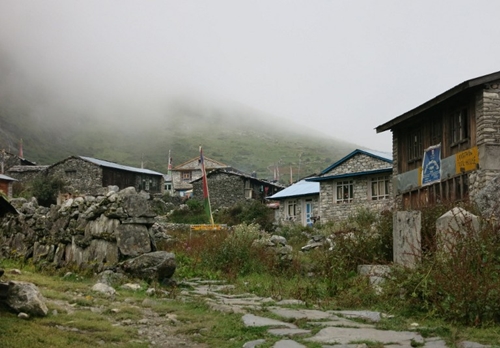 This photo taken on September 11, 2014 shows a general view of the village of Langtang, in the remote Nepalese district of Rasuwa bordering China's Tibet. Nine days after a 7.8-magnitude quake brought death and destruction to the Himalayan nation of Nepal, US helicopters on May 4, 2015 began to assess remote areas of Nepal devastated by the earthquake that killed more than 7,300 people. Many foreign victims were in the popular Langtang trekking region north of Kathmandu when the quake struck. AFP PHOTO / MOIRA SHAW