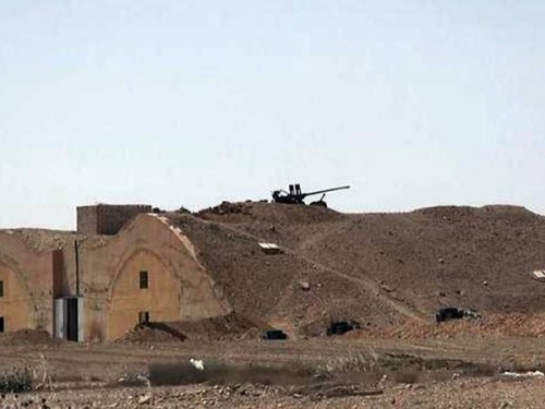 This picture released on Thursday, May 21, 2015 by the website of Islamic State militants, shows a bunker with a heavy machine gun mounted on its top at Palmyra air base that was captured by the Islamic State militants after a battle with the Syrian government forces in Palmyra, Syria. Activist and officials say members of the Islamic State group are conducting search oper ... More Caption » Share link: x   Read more at http://www.philly.com/philly/news/nation_world/20150523_ap_c85aac9ebb414048b91f37f9b0603e2c.html#qmiZk4Omt1gFoxCC.99
