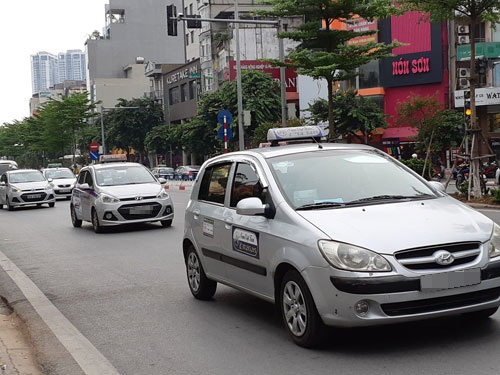 Chấm dứt tranh cãi taxi và xe công nghệ