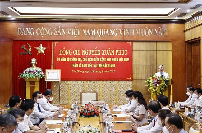 Chủ tịch nước Nguyễn Xuân Phúc phát biểu tại buổi làm việc. Ảnh: Thống Nhất - TTXVN