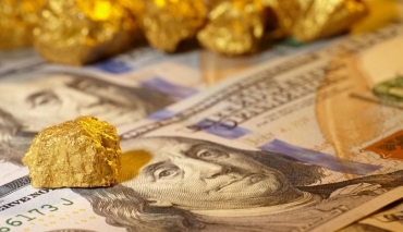 Vàng và USD đồng loạt tăng giá trong sáng nay (5/10)